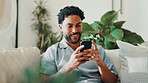 Man, relax and browsing in living room with phone, search trends or download app for online shopping. Happy, person and internet in home with tech, social media and network for ecommerce website.