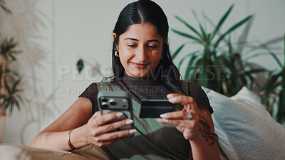 Buy stock photo Happy, woman and phone in home with credit card, set up digital wallet and app for online shopping. Person, tech and internet banking on sofa with website, EFT or payment plan for ecommerce purchase.
