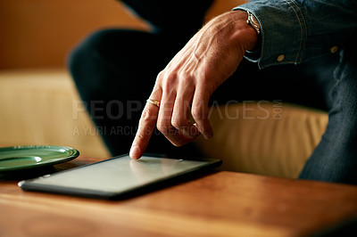 Buy stock photo Man, hands and scroll on tablet in cafe for internet search, reading online news and streaming service. Closeup, person and digital app in restaurant for email notification, check schedule or website