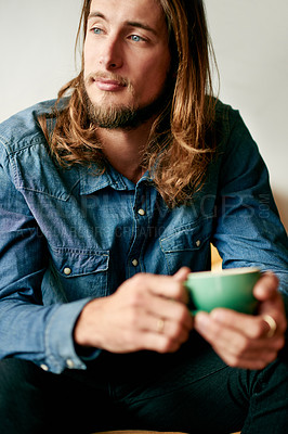 Buy stock photo Coffee, thinking and man in home in morning with calm, peace and daydreaming in living room. Smile, mug and male person with cappuccino for relaxing with planning on weekend in lounge at apartment.