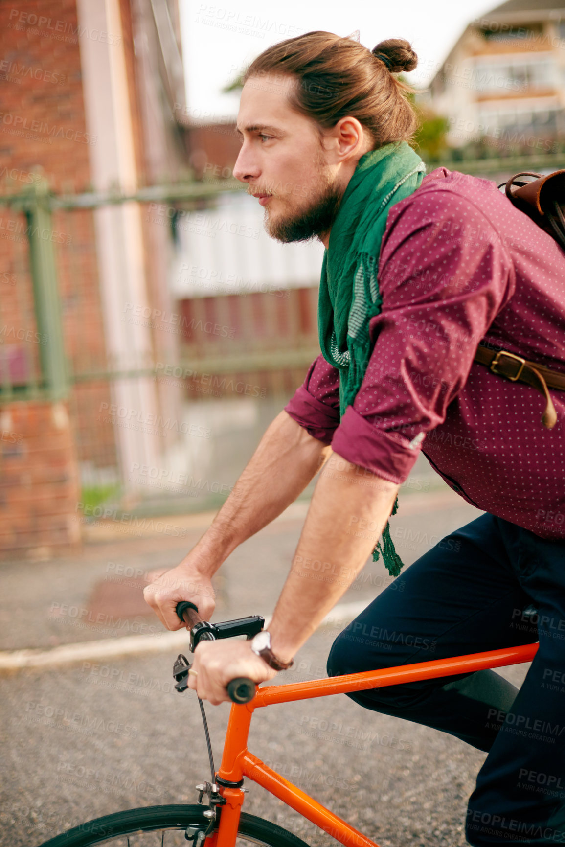Buy stock photo Commute, bicycle or man cycling in city for eco friendly transport, travel or entrepreneur. Morning, thinking or designer on road in urban town with bike, fashion or confidence for creative career