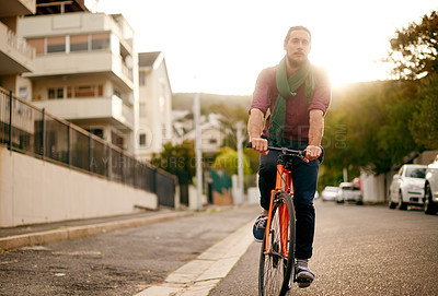 Buy stock photo Sunrise, man or bicycle in city for eco friendly transport, commute or entrepreneur. Outdoor travel, morning or designer on road in urban town with bike, fashion or confidence for creative career