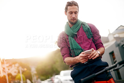 Buy stock photo Designer, phone or man on bicycle in city for eco friendly transport, commute or outdoor travel. Search, texting or entrepreneur in urban town with location, mobile app or bike for online directions
