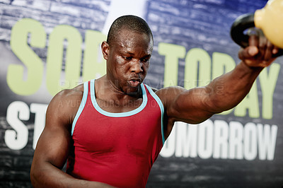 Buy stock photo Fitness, athlete or kettlebell exercise at gym for strength training, sweat or endurance challenge. Black man, bodybuilder and weights for intense performance, competition workout and weightlifting
