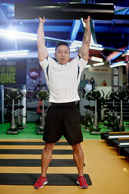 Buy stock photo Training, workout and tube with man in gym for vipr equipment, bodybuilder and challenge. Health, athlete and wellness with strong person in sports club for weightlifting, exercise and muscle