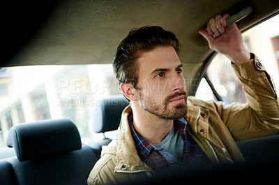 Buy stock photo Passenger, man and travel in car taxi for morning commute, ride service and transportation in urban town. City, drive and person in backseat of vehicle for journey, public cab and trip to destination