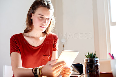 Buy stock photo Girl, teenager and relax with tablet at house for browsing social media, reading ebook and research. Female person, digital and streaming for movies, film subscription and entertainment for weekend