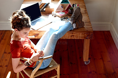 Buy stock photo Girl, relax and typing with phone in home for study break, social media scroll or reading online news. Above, teenager and smartphone for streaming subscription, web research or text message response