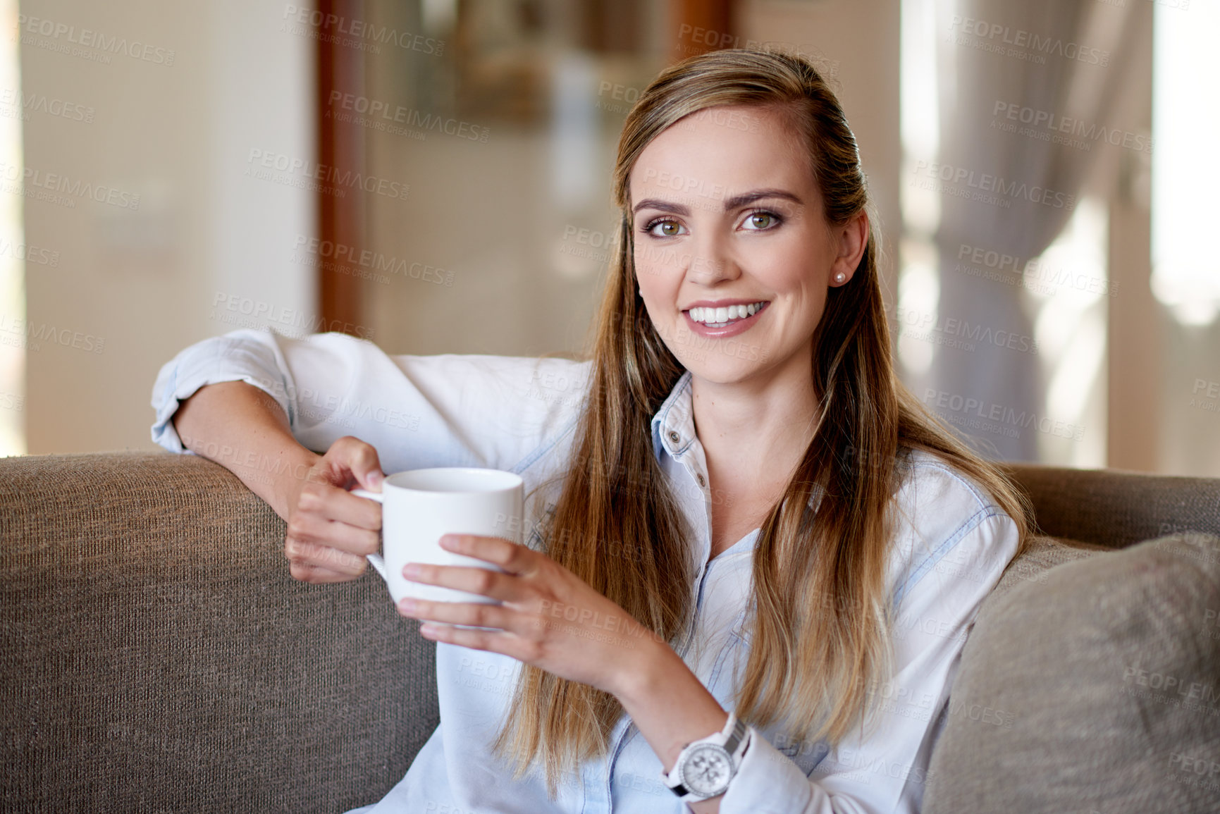 Buy stock photo Happy, coffee and portrait of woman on sofa for calm, peaceful and break in morning at home. Smile, cappuccino and female person drinking warm beverage in living room at apartment 
