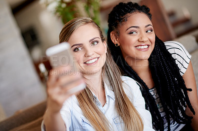 Buy stock photo Happy women, picture and sofa with selfie for holiday, weekend or photography together in home. Female people, friends or relax with smile for capture moment, bonding or memory on couch in house