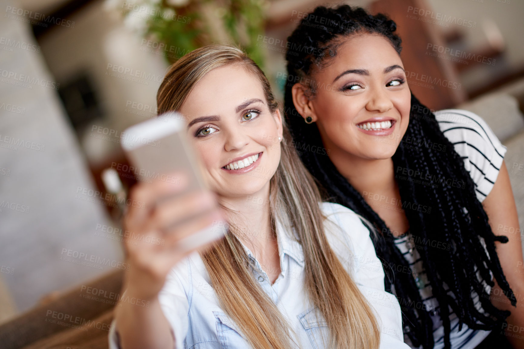 Buy stock photo Happy women, picture and sofa with selfie for holiday, weekend or photography together in home. Female people, friends or relax with smile for capture moment, bonding or memory on couch in house