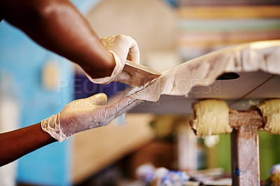 Buy stock photo Surfboard, plastic and hands of man in workshop for manufacturing, production and customization. Craft, small business and person with equipment for repairs, maintenance and renovation in factory