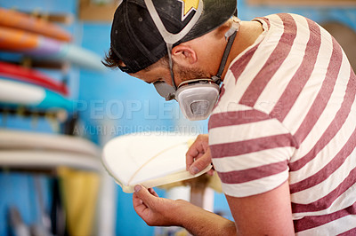 Buy stock photo Mask, tape and man with surfboard, painting and creative for talent and hobby skills. Craftsman, artist and entrepreneur with workshop PPE for design, manufacturing and custom work for artisan craft