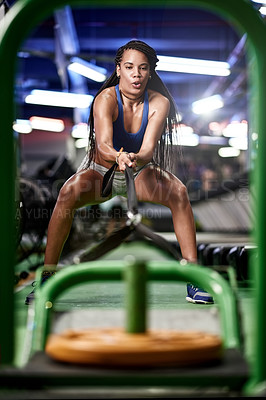 Buy stock photo Power, fitness or woman with sled for pull, muscle growth or strength development in gym. Rope, weights or strong female athlete with equipment in workout, exercise or training for cardio endurance