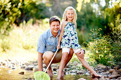 Buy stock photo Happy dad, portrait and child with fishing net at pond for catch, bonding or outdoor game in nature. Father, kid or daughter with smile or pole for fun summer or weekend together by lake or river