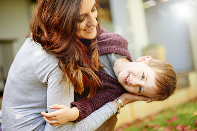 Buy stock photo Happy mom, boy and playing with child in backyard for love, childcare or outdoor weekend together. Mother, kid or playful son with smile, embrace or support for safety, protection or security in park
