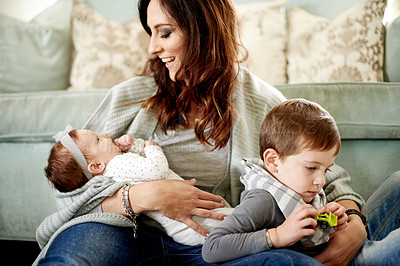 Buy stock photo Mom, baby and kid with toys in living room for bonding, love or child development. Single parent, son and mother on floor in home with comfort, trust and relax for weekend break and relationship