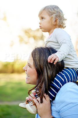 Buy stock photo Happy mom, lift and shoulder with baby in nature for bonding, weekend or outdoor adventure together. Child, kid or mother carrying daughter with smile for playful holiday, family time or walk in park