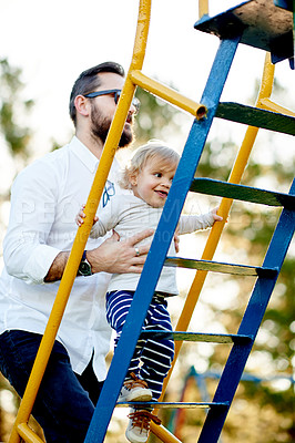 Buy stock photo Nature, jungle gym and dad with baby in park for holiday, weekend or vacation together. Smile, trees and boy kid with father for playing outdoor on playground for connection or bonding in summer.