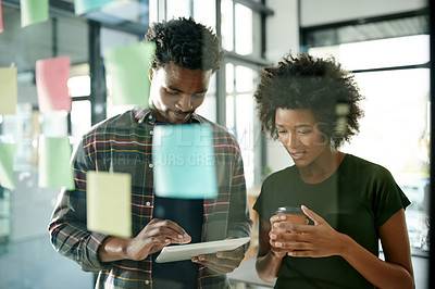 Buy stock photo Window, woman and man with tablet, brainstorming or collaboration for design on web, plan or online. Creative, graphic designer or team with tech for brand identity, app and sticky notes for strategy