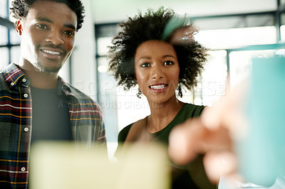 Buy stock photo Brainstorming, team and business people with strategy on glass wall in office for event themes. African workers, sticky note and meeting with schedule, plan coordination or smile for creative agenda
