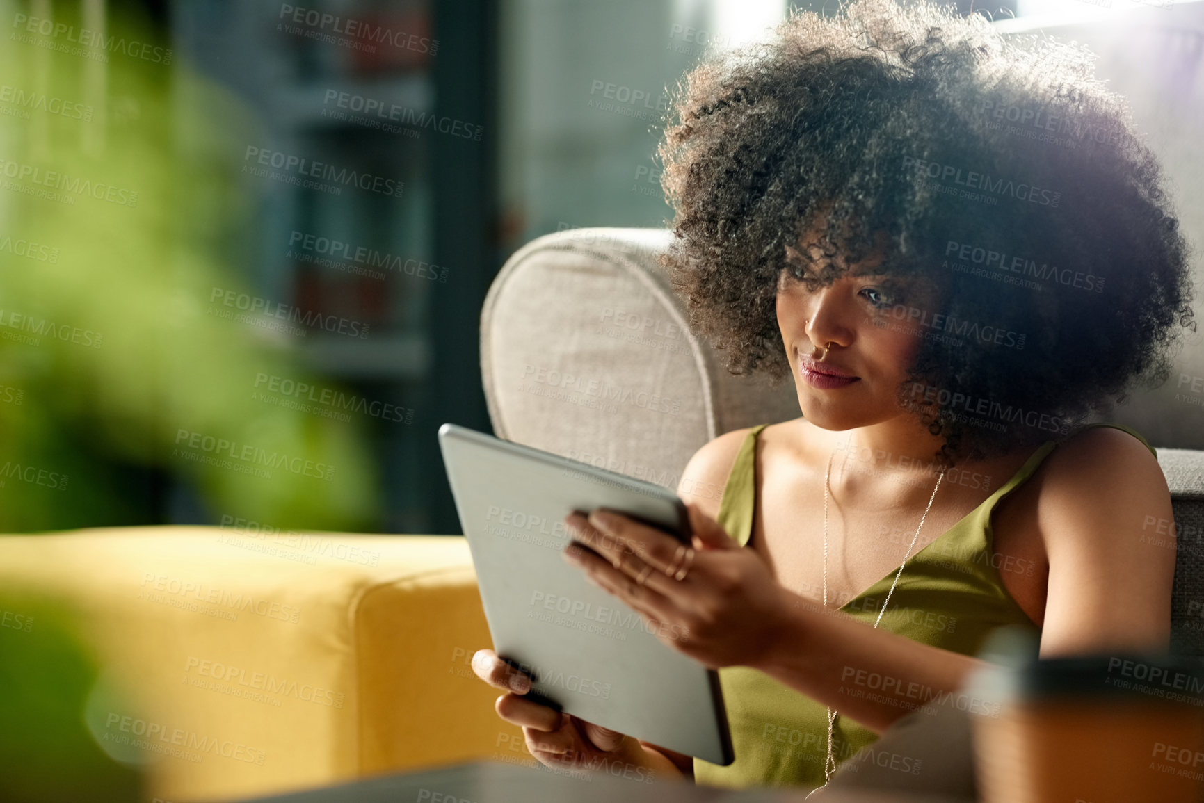 Buy stock photo Scroll, tablet and search with woman in house for social media, streaming service or connection. Movie showtimes, subscription and film schedule with person in living room of home for reading and app