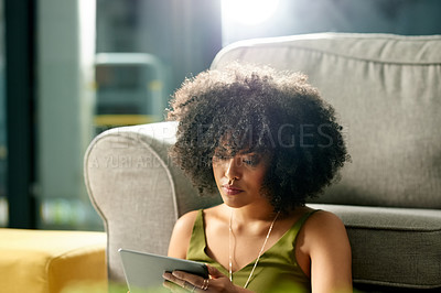 Buy stock photo Relax, tablet and online with woman in house for social media, streaming service and connection. Movie showtimes, subscription and film schedule with person in living room of home for reading and app