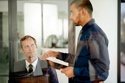 Buy stock photo Office, speaker and man with tablet, pitch or new ideas for investment opportunity or communication. Talking, people and account manager with tech for funding strategy, meeting and business growth