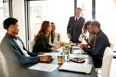 Buy stock photo Presentation, meeting and manager with business people in office for finance review, feedback and strategy. Professional, corporate and man with workers for financial report, discussion and proposal