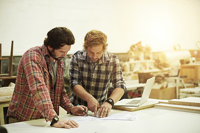 Buy stock photo Men, drawing and teamwork in carpentry workshop for blueprint, woodwork and supply chain. Collaboration, building and artisan planning in warehouse for production, project sketch or small business