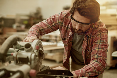 Buy stock photo Carpenter, saw and man in workshop for restoration, manufacturing and timber production. Artisan, craftsmanship and carpentry tool with machine for small business, lumber and renovation in studio
