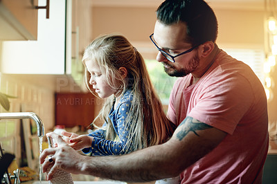 Buy stock photo Kitchen, soap or washing hands with father and daughter in home together for hygiene or safety. Basin, cleaning or tap with girl child and single parent man in apartment to remove bacteria or germs