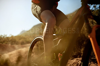 Buy stock photo Cycling, sports and legs of person on dirt road for gravel race, challenge or competition training. Fitness, mountain bike and athlete cyclist riding in mud outdoor for exercise or workout in nature.