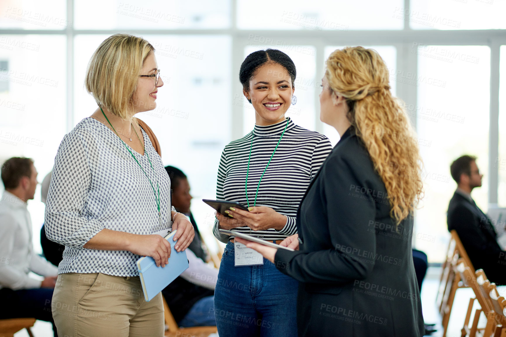 Buy stock photo Business people, meeting and convention with tablet for expo, conversation or discussion. Happy group, team or employees with smile or technology for social tradeshow or chat together in workplace