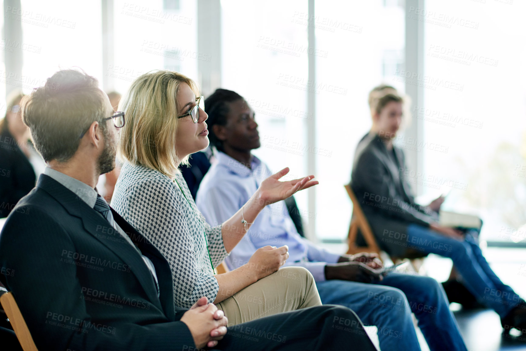 Buy stock photo Business, seminar and people at conference hall with question for learning, company planning and development. Corporate event, employees and engagement with topic for growth, discussion and feedback.