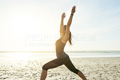 Buy stock photo Yoga, space and woman at beach in warrior pose for posture and holistic health for calm soul. Body, mockup or person stretching arms at sea for mindfulness, chakra balance or peace for awareness