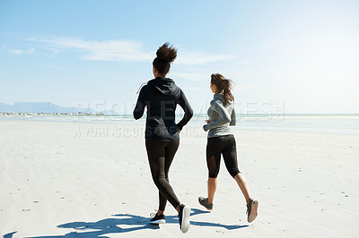 Buy stock photo Running, team and women at beach for fitness, support and workout for marathon. Friends, back and personal trainer at ocean for training hobby, exercise and cardio wellness with outdoor space.