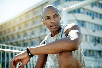 Buy stock photo Portrait, athlete and man in city, break and confident for fitness, training and wellness for sport. Outdoor, runner and black person with pride for workout routine, healthy and serious in Nigeria