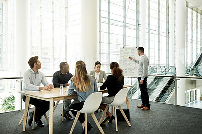Buy stock photo Meeting, presentation and speaker with business man in office for whiteboard, timeline and project progress. Pitch, planning and schedule feedback with employees in agency for brainstorming proposal