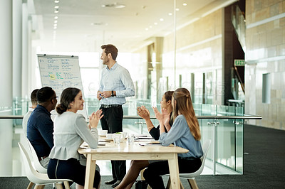 Buy stock photo Businessman, meeting or team applause with whiteboard in office for staff training or project. Male person, speaker or presentation with group clapping for company performance or success in workplace