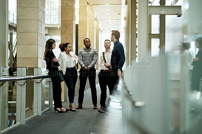 Buy stock photo Talking, team and advice with business people in hotel for meeting, conference expo and partnership. Discussion, collaboration and seminar event with employees on bridge of convention center for trip