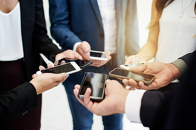 Buy stock photo Phone, hands and business people in circle in office for connectivity, networking or communication. Technology, team and group of lawyers with cellphone for email with collaboration in workplace.