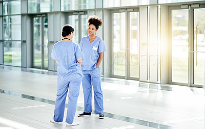 Buy stock photo Women, nurse and discussion in lobby for medical history, patient results or planning at hospital. People, conversation and healthcare workers with opinion, advice or health procedure at clinic