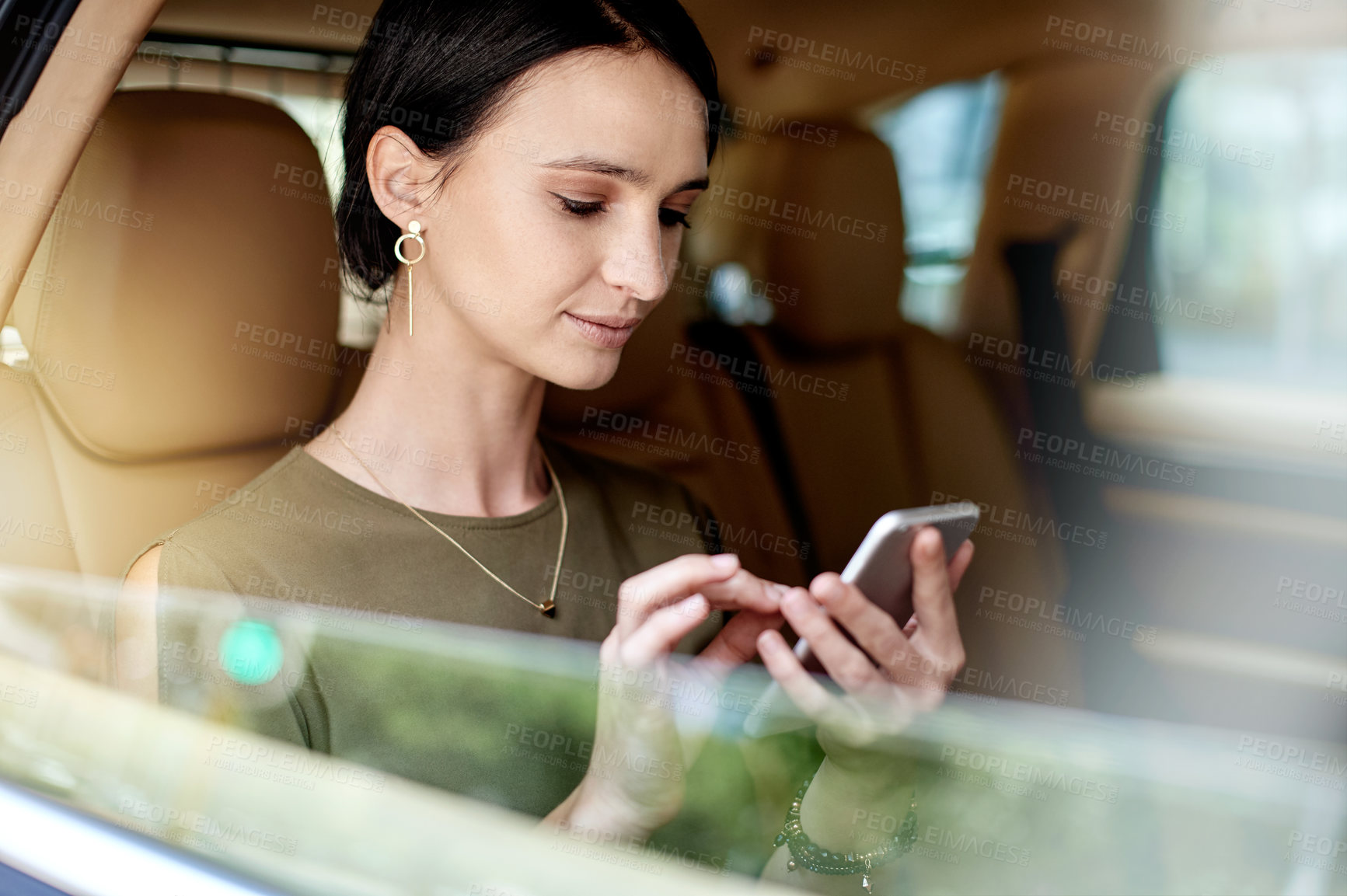 Buy stock photo Scroll, city and woman in car window with phone, online communication or daily commute to workplace. Reading, digital and consultant in vehicle with mobile, email or message update on urban travel.