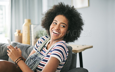 Buy stock photo Funny, phone and thinking with woman on sofa in living room of home for reaction to meme. App, laughing and social media with happy African person in apartment for comedy, communication or humor