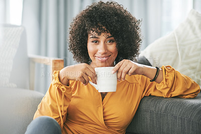 Buy stock photo Woman, happy and portrait with tea in living room, unwind or routine to relax with drink in house. Smile, comfortable and African person with warm beverage for rest, break or weekend at apartment