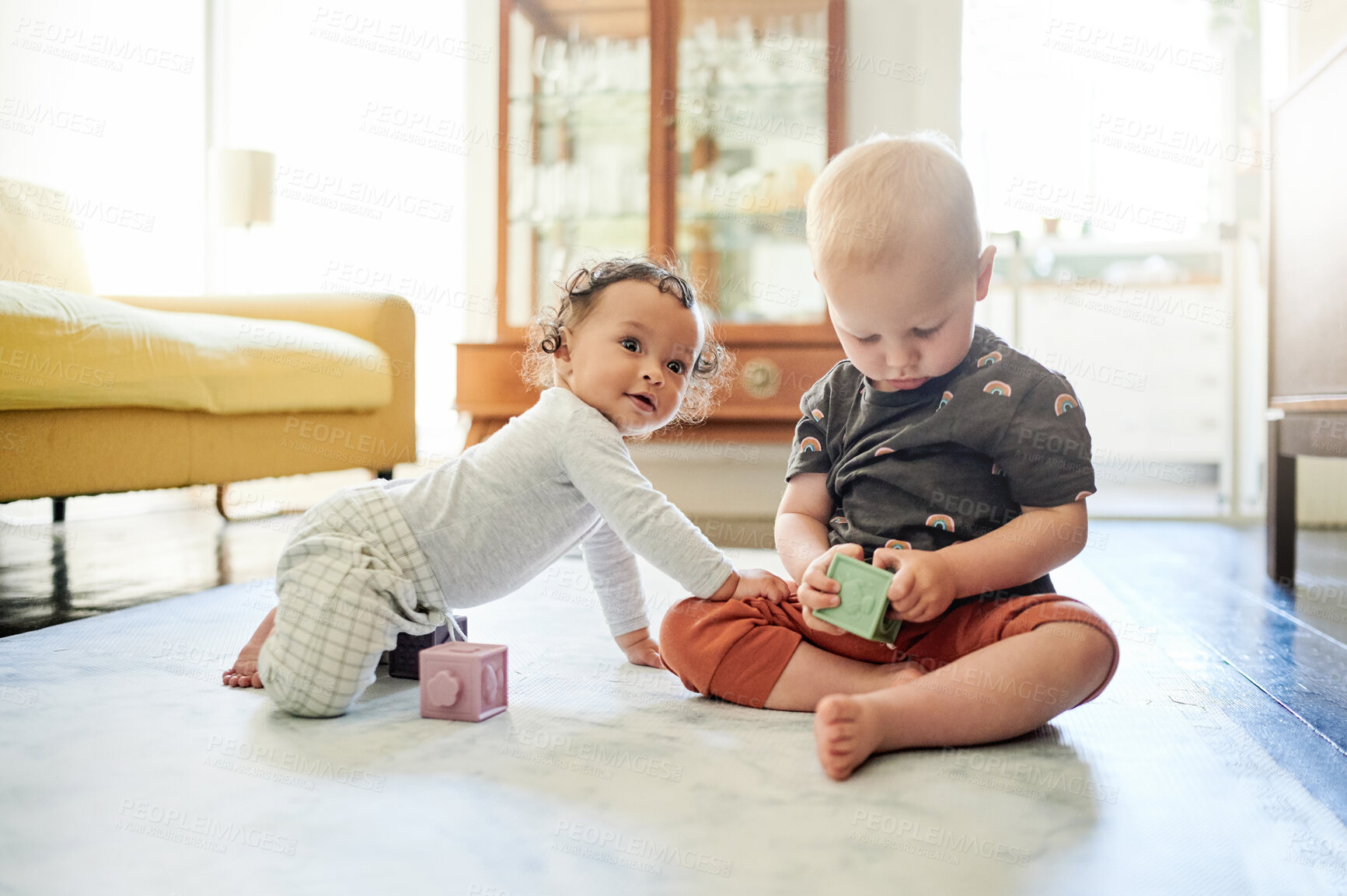Buy stock photo Happy baby, home and kid toys for mobility development and learning together in a bedroom. Nursery, toy block and cute children curious about building game and activity in a house on the floor