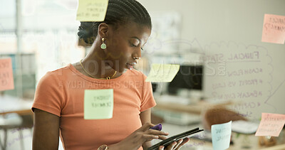 Buy stock photo Brainstorming, board or black woman with tablet, research or tech for networking on social media. Digital agency, project agenda or African worker on website online for planning, solution or calendar