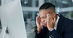 Businessman, headache and burnout in office with computer, pain and delete finance report by mistake. African person, fatigue and glitch in workplace with desktop, migraine or financial audit crisis.