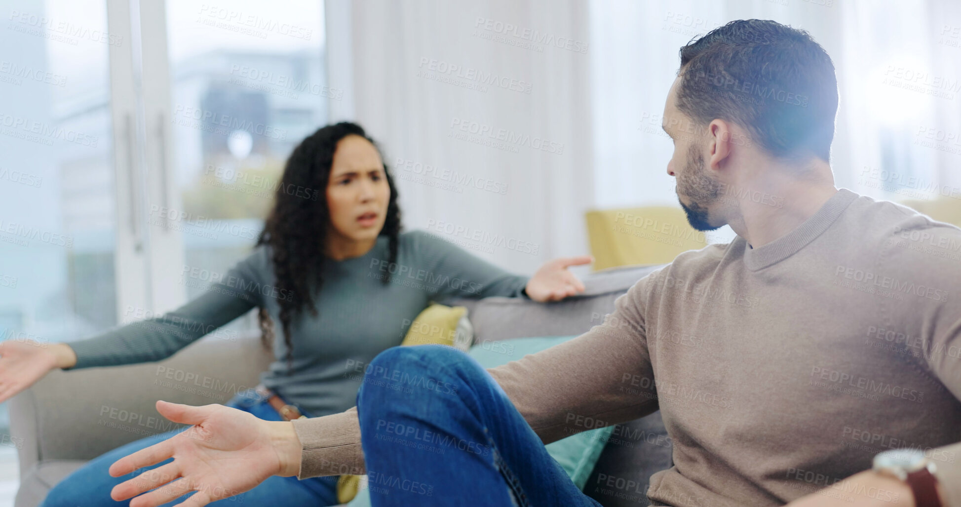 Buy stock photo Couple, conflict and man on sofa with argument, confrontation or gaslighting for cheating. Angry, infidelity dispute or disagreement in home for marriage betrayal, partner manipulation or deny affair